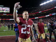 San Francisco 49ers running back Christian McCaffrey (23) celebrates after an NFL divisional round playoff football game against the Dallas Cowboys in Santa Clara, Calif., Sunday, Jan. 22, 2023.