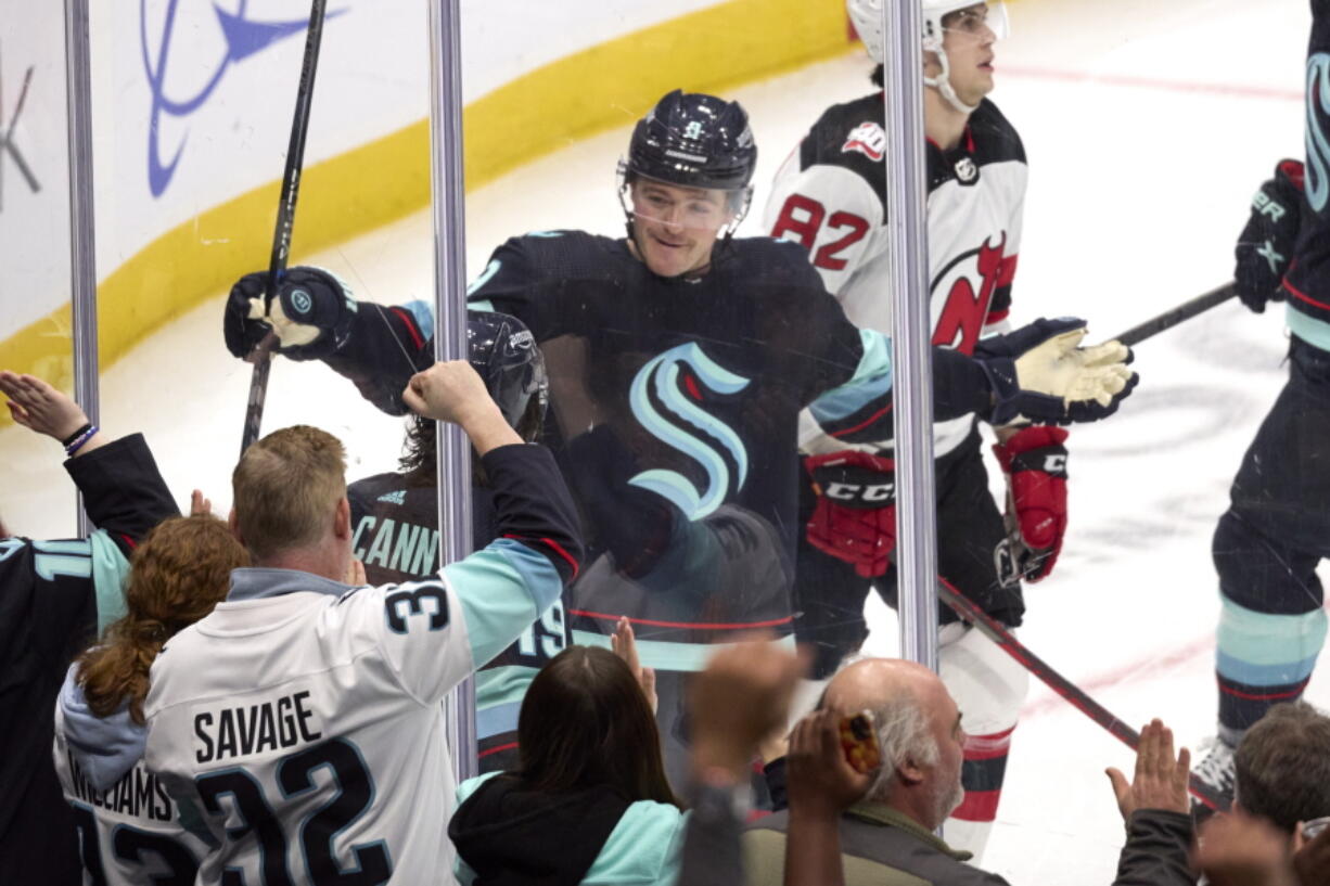 Seattle Krakencenter Ryan Donato (9) celebrates after scoring against the New Jersey Devils during the second period of an NHL hockey game, Thursday, Jan. 19, 2023, in Seattle.