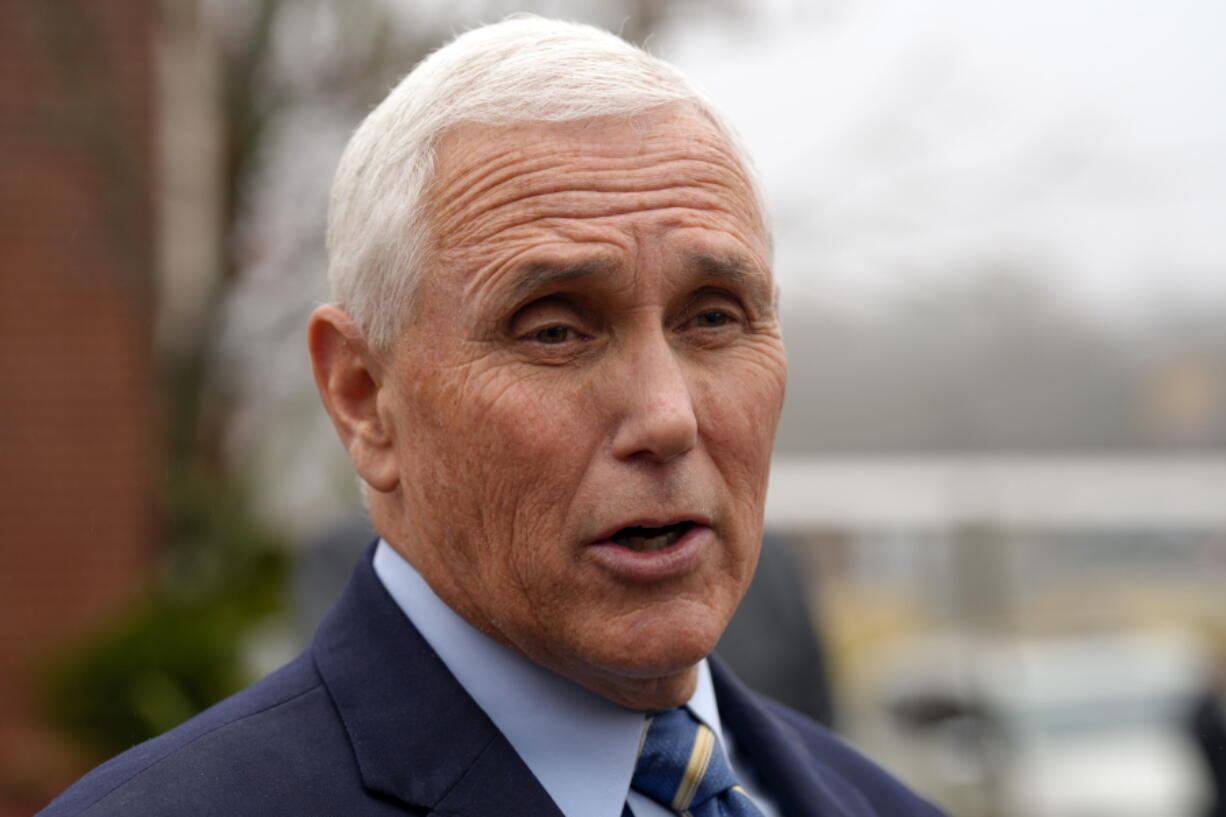 FILE - Former Vice President Mike Pence speaks with reporters Dec. 6, 2022, at Garden Sanctuary Church of God in Rock Hill, S.C. The executive director of former U.N.