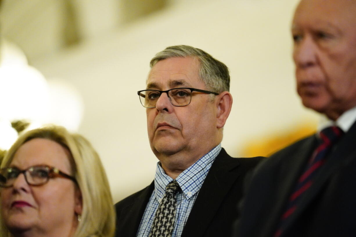 FILE - State Sen. Cris Dush, R-Jefferson, listens during a news conference in Harrisburg, Pa., Feb. 8, 2022.