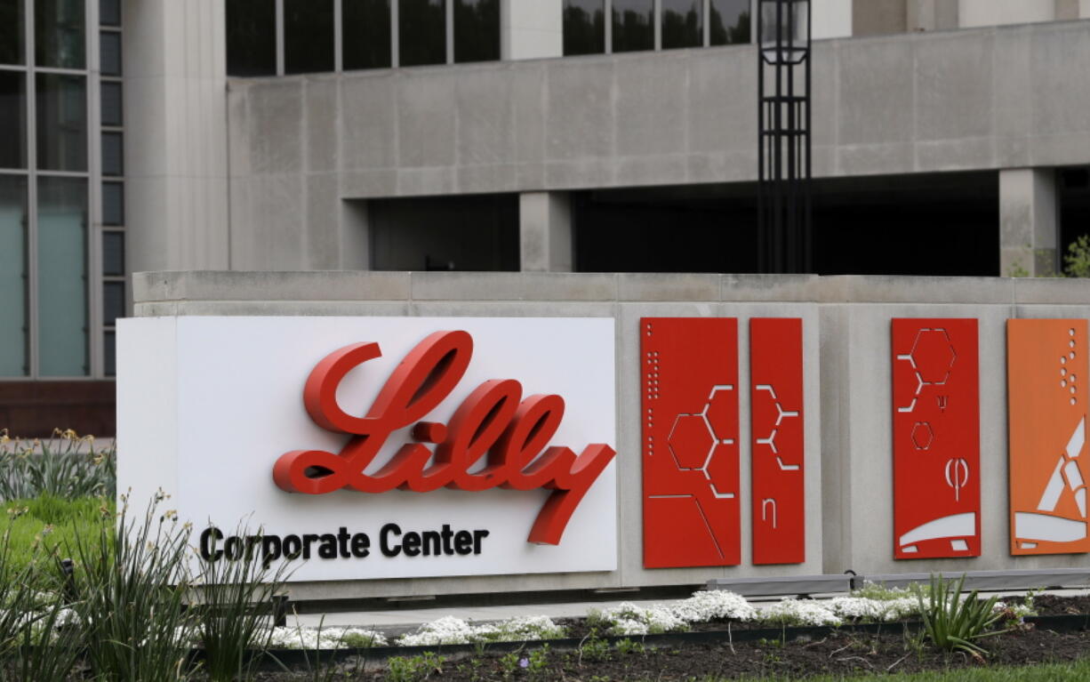 FILE - This April 26, 2017, file photo shows the Eli Lilly & Co. corporate headquarters in Indianapolis.  Eli Lilly shares slipped Friday, Jan. 20, 2023, after regulators said they need to see more data on the company's application for a quick approval of its potential Alzheimer's disease treatment.