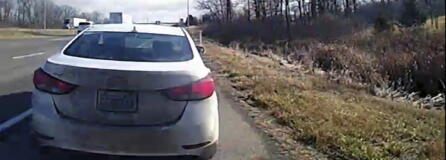 In this image from a bodycam video provided by the Hancock County Sheriff's Office, a white Hyundai Elantra occupied by Bryan Kohberger and his father is seen on a deputy's body camera video during a traffic stop on Thursday, Dec. 15, 2022, in Hancock County, Ind. Bryan Kohberger, accused in the November slayings of four University of Idaho students, had a first court appearance on Jan. 5, 2023 in Latah County Court in Moscow, Idaho on first-degree murder charges.