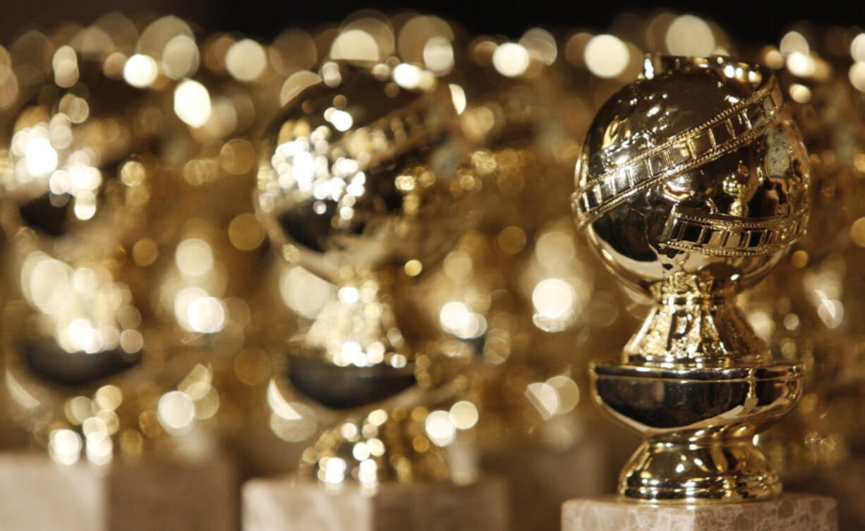 FILE - In this Jan.. 6, 2009, file photo, Golden Globe statuettes are seen during a news conference at the Beverly Hilton Hotel in Beverly Hills, Calif. The 80th annual Golden Globe Awards will take place on Tuesday, Jan. 10.