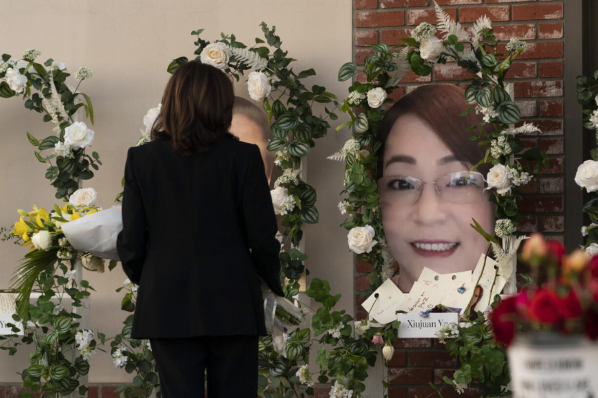 Vice President Kamala Harris visits a memorial set up outside Star Dance Studio in Monterey Park, Calif., Wednesday, Jan. 25, 2023, to honor the victims killed in last week's mass shooting. (AP Photo/Jae C.