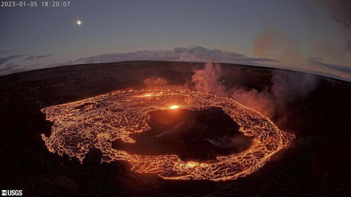 This webcam image provided by the U.S. Geological Survey shows Hawaii's Kilauea volcano, from the west rim of the summit caldera, looking east, Thursday, Jan. 5, 2023. Hawaii's Kilauea began erupting inside its summit crater Thursday, the U.S. Geological Survey said, less than one month after the volcano and its larger neighbor Mauna Loa stopped releasing lava. ( U.S.