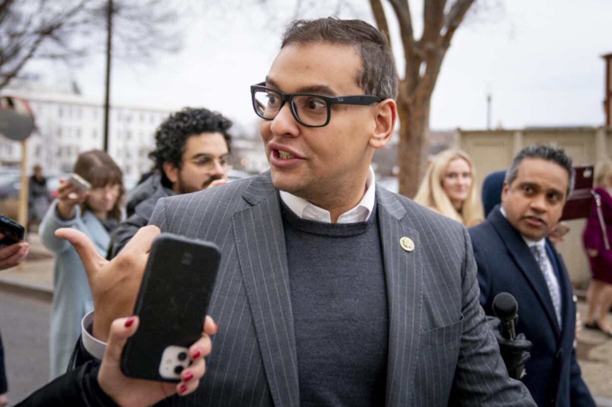 Rep. George Santos, R-N.Y., leaves a House GOP conference meeting on Capitol Hill in Washington, Wednesday, Jan. 25, 2023.