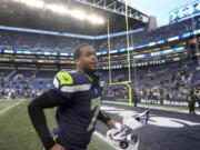 Seattle Seahawks quarterback Geno Smith (7) leaves the field after an NFL football game against the New York Jets, Sunday, Jan. 1, 2023, in Seattle. The Seahawks defeated the Jets 23-6. (AP Photo/Ted S.