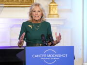 FILE - First lady Jill Biden speaks during an event to launch the American Cancer Society's national roundtables on breast and cervical cancer in the State Dining Room of the White House, Oct. 24, 2022, in Washington.