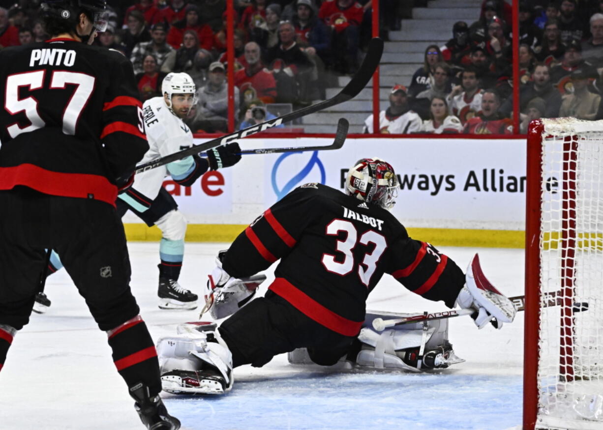 Seattle Kraken right wing Jordan Eberle (7) scores against Ottawa Senators goaltender Cam Talbot (33) during third-period NHL hockey game action in Ottawa, Ontario, Saturday, Jan. 7, 2023.