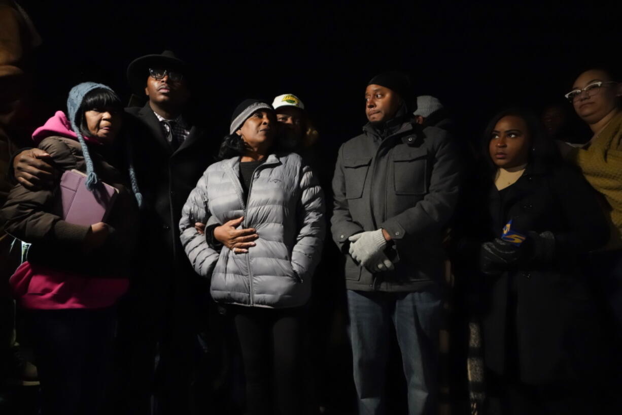 RowVaughn Wells, center, mother of Tyre Nichols, who died after being beaten by Memphis police officers, is comforted by his stepfather Rodney Wells, at the conclusion of a candlelight vigil for Tyre, in Memphis, Tenn., Thursday, Jan. 26, 2023.