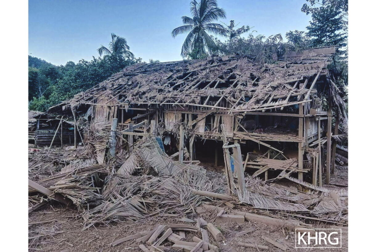 Homes are destroyed by suspected military air strikes in the district of  Mutraw, also known as Papun, in eastern Myanmar's Karen State, Friday, Jan. 13, 2023. Air strikes this week by Myanmar's military on villages inhabited largely by the Karen ethnic minority killed a number of civilians, and destroyed two churches, two relief organizations said Friday.