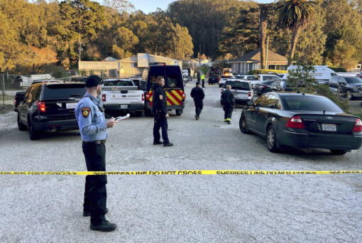 First responders work one of several crime scenes where multiple people were shot and killed, Monday, Jan. 23, 2023, off state Highway 92 in Half Moon Bay, Calif., according to the San Mateo County Sheriff's Office. (Nhat V.