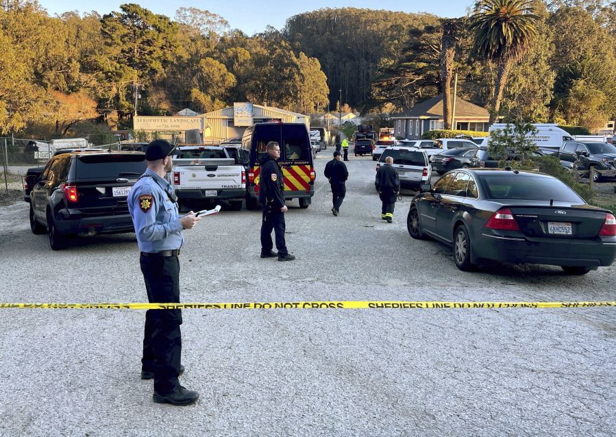 First responders work one of several crime scenes where multiple people were shot and killed, Monday, Jan. 23, 2023, off state Highway 92 in Half Moon Bay, Calif., according to the San Mateo County Sheriff's Office. (Nhat V.