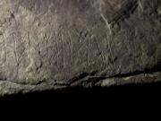 The runestone found at Tyrifjorden, Norway, is shown at the Museum of Cultural History in Oslo, Thursday, Jan. 12, 2023. Archaeologists with the Museum of Cultural History in Oslo said Tuesday, Jan. 17, 2023 that have found a runestone which they claim is the world's oldest, saying the inscriptions are up to 2,000 years old and date back to the earliest days of the enigmatic history of runic writing.