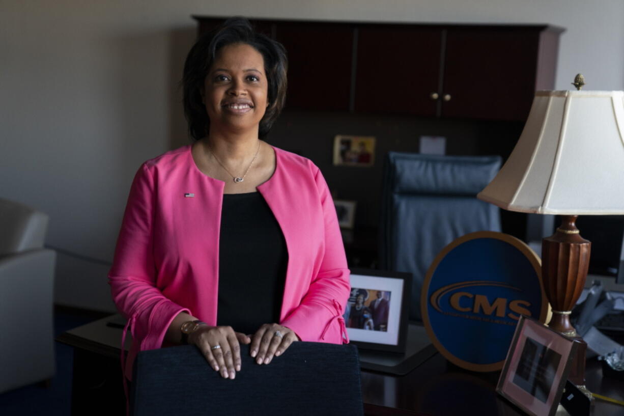 FILE - Chiquita Brooks-LaSure, the Administrator for the Centers of Medicare and Medicaid Services, poses for a photograph in her office, Feb. 9, 2022, in Washington. The federal government is cracking down on nursing homes' abuse of antipsychotic drugs after an investigation in 2022 revealed an overwhelming majority of their residents are prescribed the medication.