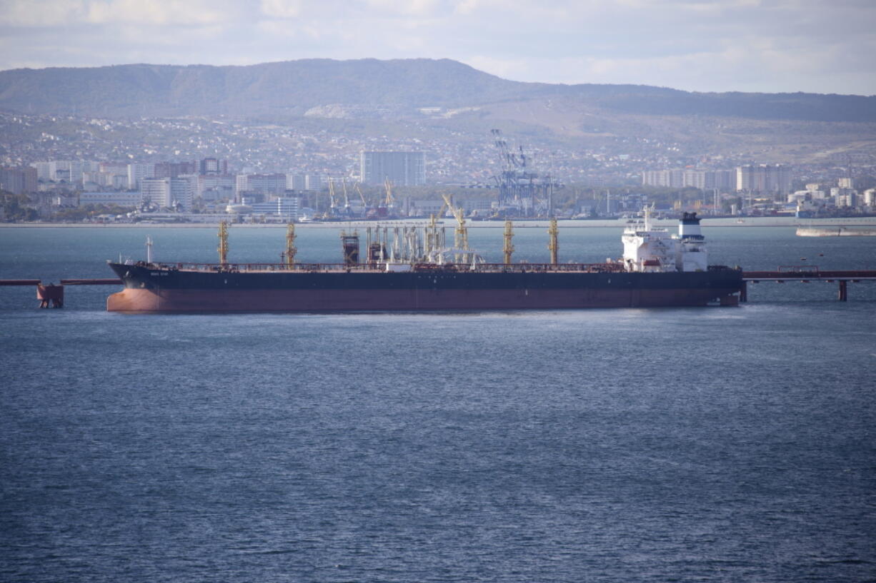 FILE - An oil tanker is moored at the Sheskharis complex, part of Chernomortransneft JSC, a subsidiary of Transneft PJSC, in Novorossiysk, Russia, on Oct. 11, 2022. A price cap and European Union embargo on most Russian oil have cut into Moscow's revenue from fossil fuels, but the Kremlin is still earning substantial cash to fund its war in Ukraine because the $60-per-barrel cap was "too lenient," researchers said Wednesday, Jan. 11, 2023.