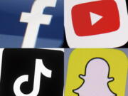 This combination of 2017-2022 photos shows the logos of Facebook, YouTube, TikTok and Snapchat on mobile devices. On Friday, Jan. 6, 2023, Seattle Public Schools filed a lawsuit in U.S. District Court, suing the tech giants behind TikTok, Instagram, Facebook, YouTube and Snapchat, seeking to hold them accountable for the mental health crisis among youth.