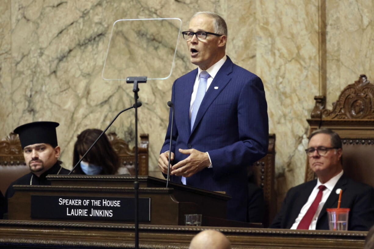 Washington Gov. Jay Inslee delivers his 2023 State of the State address at the Capitol in Olympia on Jan. 10. Inslee took the rare step of testifying at a Senate committee meeting Tuesday to show his support for a proposed state constitutional amendment protecting the right to abortion in Washington.