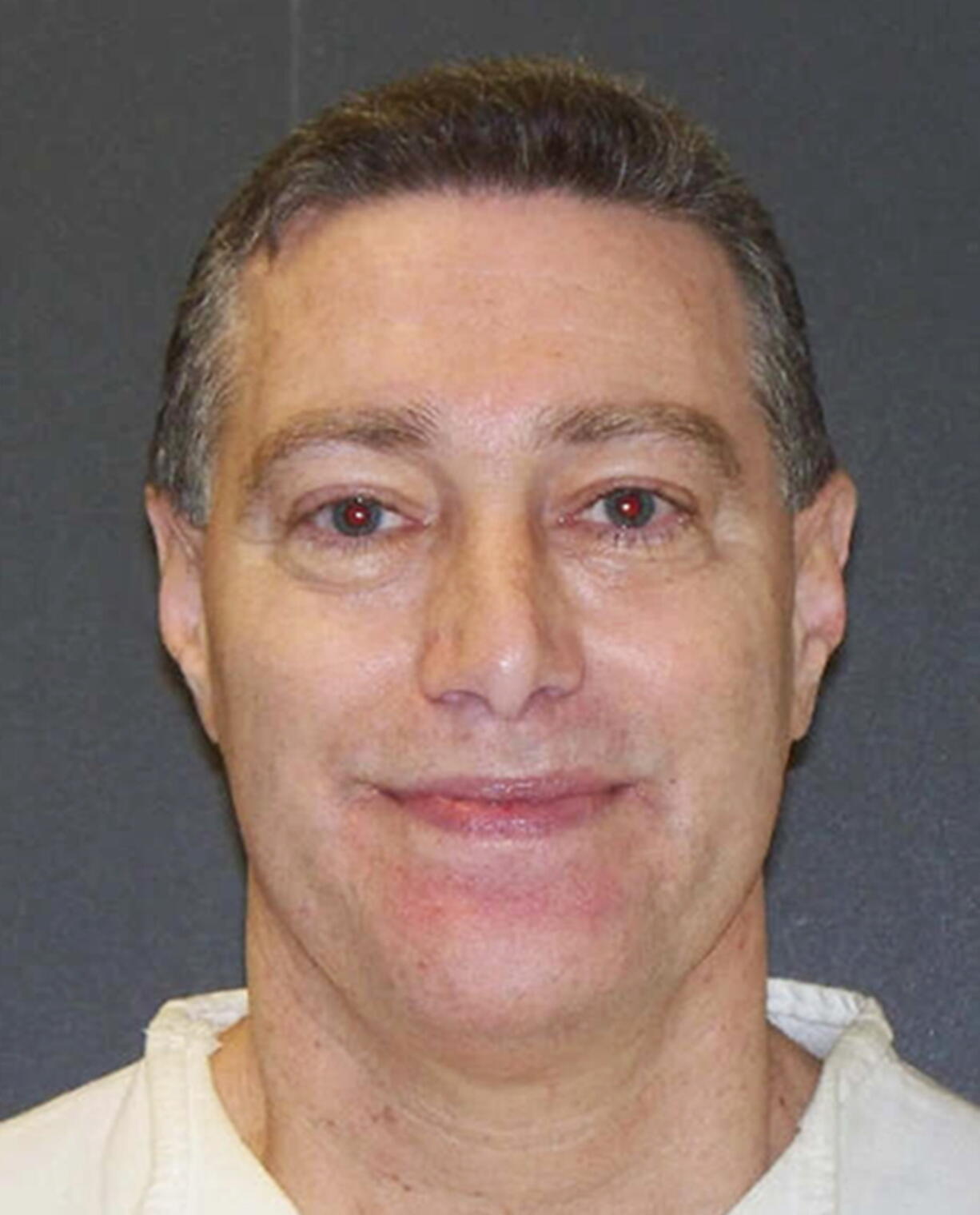 FILE - This booking photo provided by the Texas Department of Criminal Justice shows Robert Fratta, a former suburban Houston police officer on death row. Fratta was set to be executed on Tuesday, Jan. 10, 2023, for hiring two people to kill his estranged wife nearly 30 years ago.