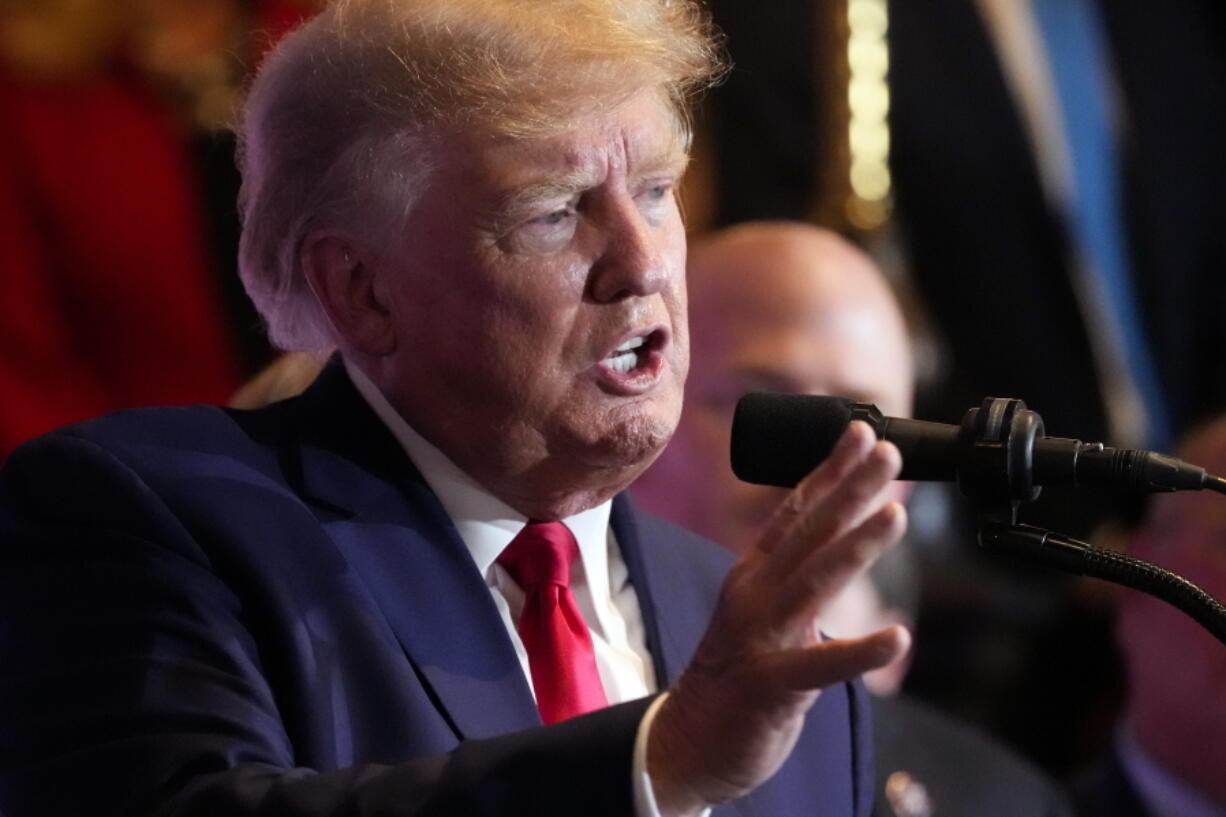 FILE - Former President Donald Trump speaks at a campaign event at the South Carolina Statehouse, Jan. 28, 2023, in Columbia, S.C. Trump and his allies have been put on notice by a prosecutor, but the warning didn't come from anyone at the Justice Department. It's from a Georgia prosecutor who indicates she is likely to seek criminal charges soon in a two-year election subversion probe.