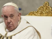 FILE - Pope Francis presides over an Epiphany mass in St.Peter's Basilica, at the Vatican, on Jan. 6, 2023. Pope Francis on Monday Jan.