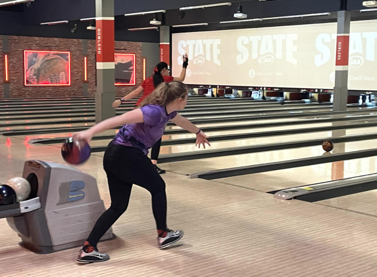 Columbia River senior Sadie Burrows gets ready to release her ball on day one of the 1A/2A state bowling championships on Friday at Bowlero in Tukwila.