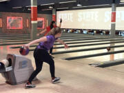 Columbia River senior Sadie Burrows gets ready to release her ball on day one of the 1A/2A state bowling championships on Friday at Bowlero in Tukwila.