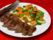 Glazed Steak with Sweet Potatoes and Zucchini.