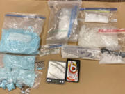 Clark County Sheriff's Office investigators say they recently seized this drug evidence during a fentanyl sting. The agency said the evidence includes 13,000 fentanyl pills and 2 pounds of methamphetamine.