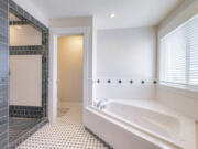 Doorless walk-in showers are a great way to upgrade your bathroom into a place of pure luxury.