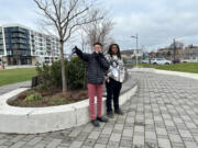 Je'Kai Kazmende, left, stands next to his cousin, Jahad Hudson, as he leads a walking tour of Vancouver. He points out a spot where he had an encounter with police officers that he said felt unjust.