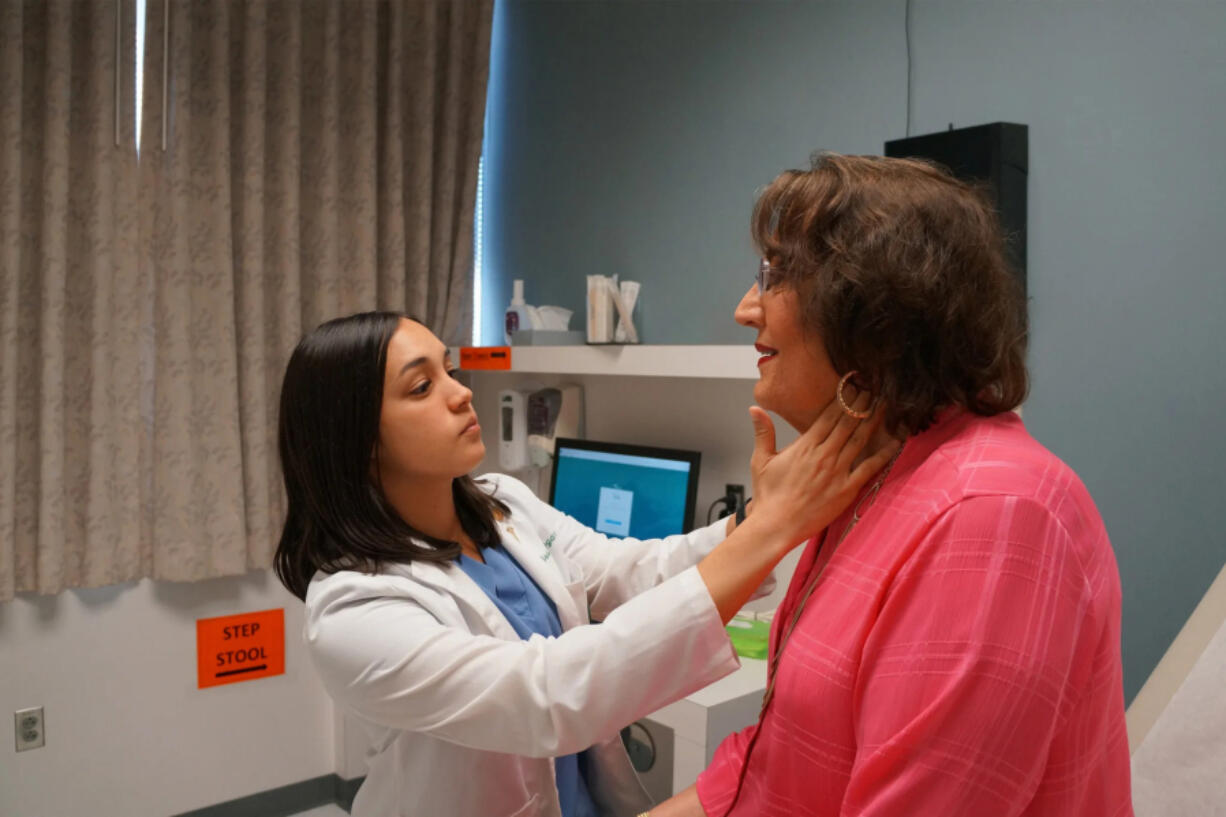 Elaine Stephens is examined by a medical student in University of Alabama-Birmingham???s standardized patient program. In the early years of this program, Stephens says, some students??? bedside manner would change once she revealed she was transgender.