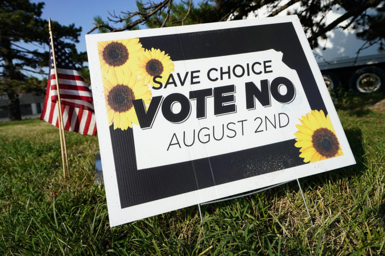 A "Vote No" sign is on display outside a polling station on Aug. 1, 2022, in Olathe, Kansas. Kansas voters rejected an amendment to the state constitution that would have removed protections for abortion. Stung by progressives' success in using ballot measures to advance their policy priorities, Republicans in multiple states are trying to make the ballot initiative process more challenging.