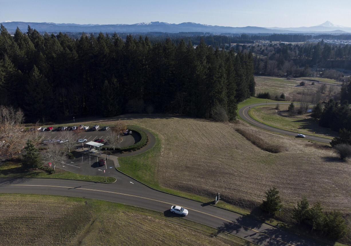 Washington State University Vancouver's first residence halls would be located on the south end of campus, just off the winding road that leads visitors from the entrance. The halls, when finished, would be built into the slope facing the parking lot so as not to block panoramic mountain views for nearby homes.