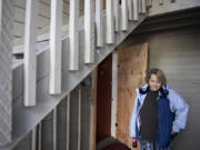 More than three months after a fire at Fox Pointe apartments, resident Wilma Pomeroy's one-bedroom unit still has no electricity or hot water. Plywood was put over her front door after firefighters kicked it in.