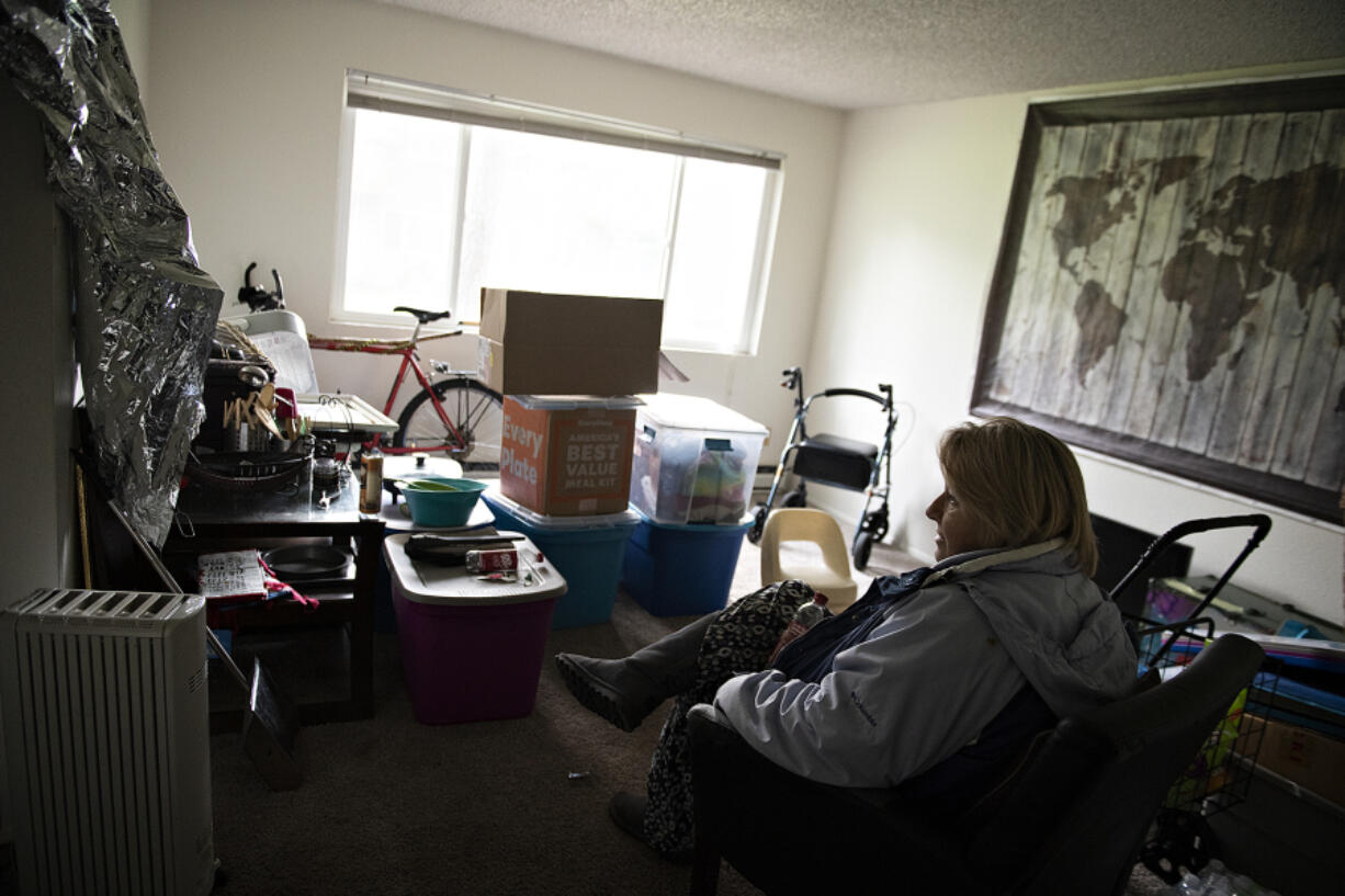 Low-income Vancouver resident Wilma Pomeroy, above and at top, is still living in uninhabitable conditions following a fire at Fox Pointe apartments in October. Poor management by Fox Pointe and limitations of the federal housing choice voucher program, also known as Section 8, have prevented her from finding a new apartment.