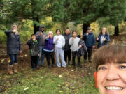 Rocio Pedrozo, Watershed Alliance of Southwest Washington Spanish interpreter, and volunteers at the nonprofit's Day of the Dead planting.