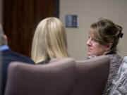 Stephanie "Sam" Westby, right, is seated next to her attorneys during the opening of her murder trial Monday morning at the Clark County Courthouse. She's accused of killing her husband during a confrontation over him having an affair.