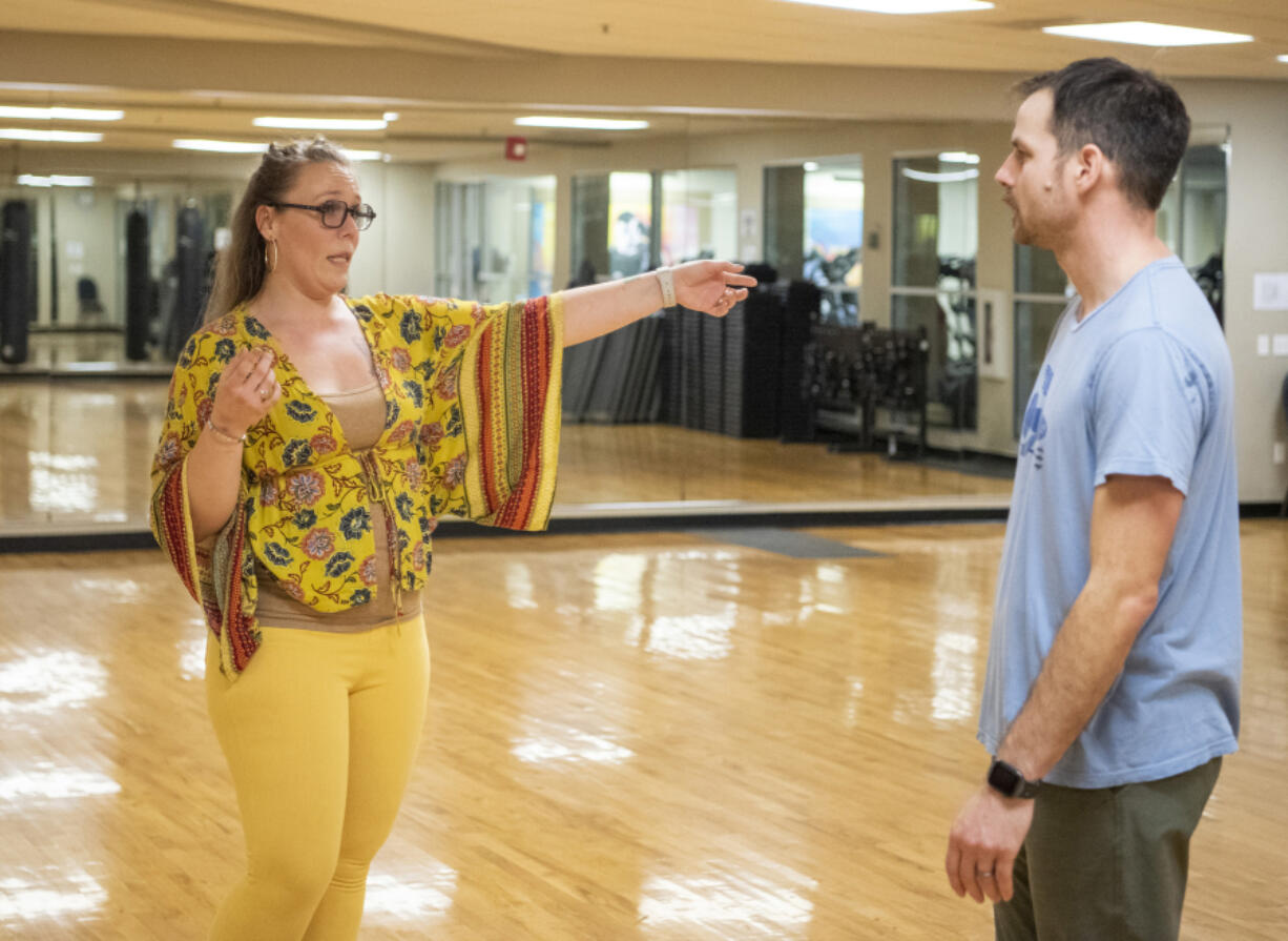 Instructor Dani Synarski, lefts, directs Jesse Braman during their dance practice at LA Fitness in Hazel Dell. Braman is among the "local stars" who will compete at ilani on March 4 in the Rotary Club of Three Creeks' community fundraiser Dancing with the Local Stars.