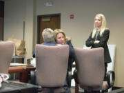 Stephanie "Sam" Westby, center, hugs her attorney Steve Thayer while her other attorney, Jacy Thayer, right, looks on Thursday afternoon in Clark County Superior Court. A judge acquitted her of second-degree murder and first-degree assault charges in the September 2019 fatal shooting of her husband.