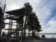 Visitors climb three flights of stairs to the top of the Henry J. Kaiser Memorial Shipyard Memorial tower, alongside the Columbia River in Vancouver's Marine Park.