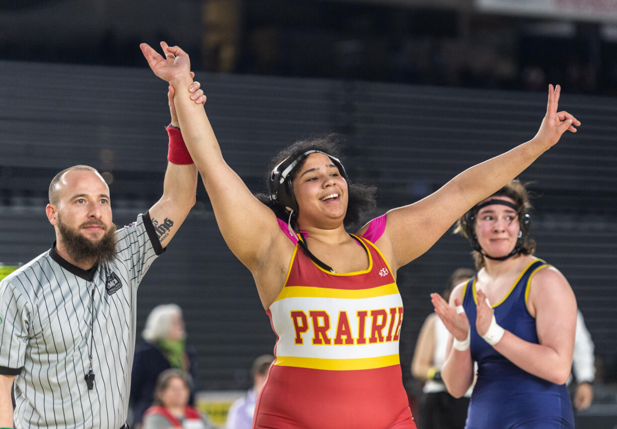 Prairie’s Faith Tarrant, 235 pounds, holds up the two fingers after winning her second title over Everett’s Mia Cienega at Mat Classic XXXIV on Saturday, February 18, 2023, at the Tacoma Dome.