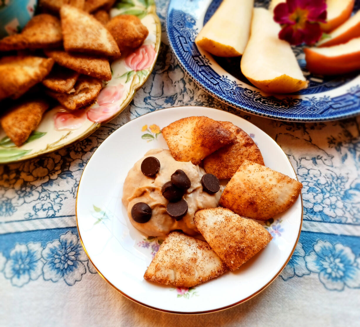 Make your own sweet pita chips by baking them with cinnamon and sugar. Serve them with this chocolate chip-studded "cookie dough" dip.