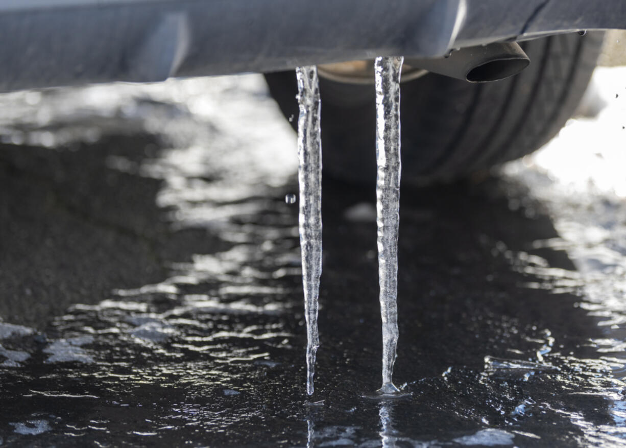 The melt-refreeze cycle created impressive icicles on this parked vehicle in Clark County on Friday. Although there was sunshine and several hours of above-freezing temperatures on Friday, below-freezing temperatures on Saturday night and Sunday morning are expected to bring snow to Clark County.