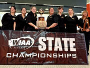 Evergreen girls bowling with the 3A state championship trophy on Thursday, Feb. 2, 2023, at Bowlero in Tukwila. It is the Plainsmen’s fifth state title out of the last six tournaments held.