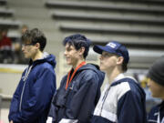 Parker Dangleis of Hockinson stands on the podium after finishing second in the 100 freestyle at the 2A boys swimming state meet in Federal Way on Saturday, Feb. 18, 2023.