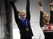 Camas' Madi Williams edged out teammate Hallie Kempf (right) to win the all-around title at the 4A District 4 gymnastics meet at Northpointe on Saturday, Feb. 11, 2023.