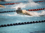 Sam Empey of Union swims to victory in the 100 butterfly at the 4A boys swimming state meet in Federal Way on Saturday, Feb. 18, 2023.