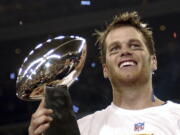 Quarterback Tom Brady, who won a record seven Super Bowls for New England and Tampa, has announced his retirement, Wednesday, Feb. 1, 2023.