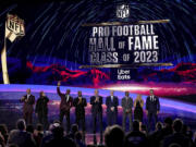 The Pro football Hall of Fame class of 2023 poses during the NFL Honors award show ahead of the Super Bowl 57 football game,Thursday, Feb. 9, 2023, in Phoenix. (AP Photo/David J.